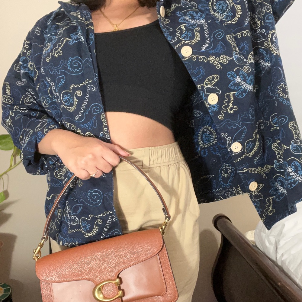 A unique vintage addition to your closet pull out to make your statement
